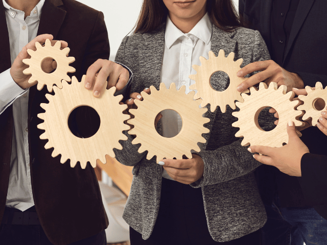 people hold gears, for effective marketing